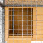 2 Level Outdoor Rabbit Hutch with Asphalt Roof, Removable Tray and Ramp, Light Yellow - Image 10