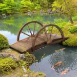 Outsunny 3.3 Ft Wooden Garden Bridge Arc Footbridge with Half-Wheel Style Railings and Solid Fir Construction, Stained Wood - Image 10