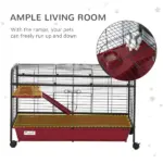 41"L Small Animal Cage, Rabbit Guinea Pig Hutch, Ferret Pet Play House with Feeder, Rolling Wheels, Platform and Ramp, Red/Black - Image 4
