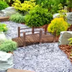 Outsunny 5 Ft Fir Wood Garden Bridge with Side Railings, Arc Walkway for Backyards, Gardens and Streams, Stained Wood - Image 9