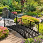 7' Metal Arch Garden Bridge Arc Footbridge with Side Railings Decorative Scrollwork, Black - Image 9
