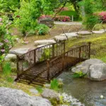7' Metal Arch Garden Bridge Arc Footbridge with Side Railings Decorative Scrollwork, Bronze - Image 2