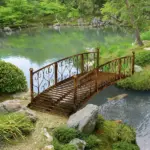 7' Metal Arch Garden Bridge Arc Footbridge with Side Railings Decorative Scrollwork, Bronze - Image 7