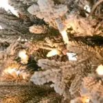 HOMCOM 7.5 ft Flocked Christmas Tree Pre Lit, with Snow Branches, Warm Yellow Clear Lights, Auto Open, Extra Bulb - Image 9