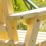 Garden Loveseat with Umbrella Hole Middle Table Natural Wood Tone - Image 9