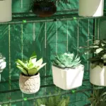 Outsunny Mini Greenhouse, Portable Greenhouse with 4 Tier Shelves, Roll-Up Door, and Plastic Cover, 41.3" x 17.7" x 63", Green - Image 9