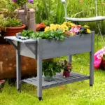 Outsunny Raised Garden Bed Planter Box with 8 Grow Grids, Storage Shelf and Lockable Wheels - Image 10